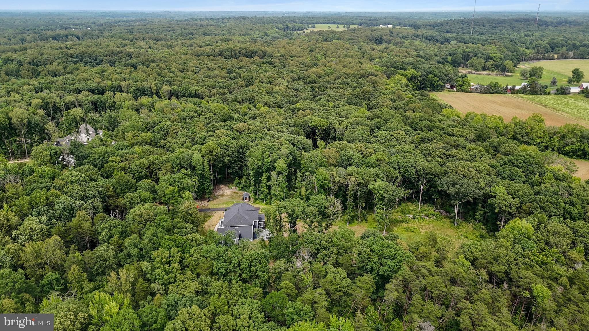 80 Shackelford Well Road Fredericksburg, VA 22406 - Photo 95 of 108 an aerial view of residential houses with outdoor space and trees