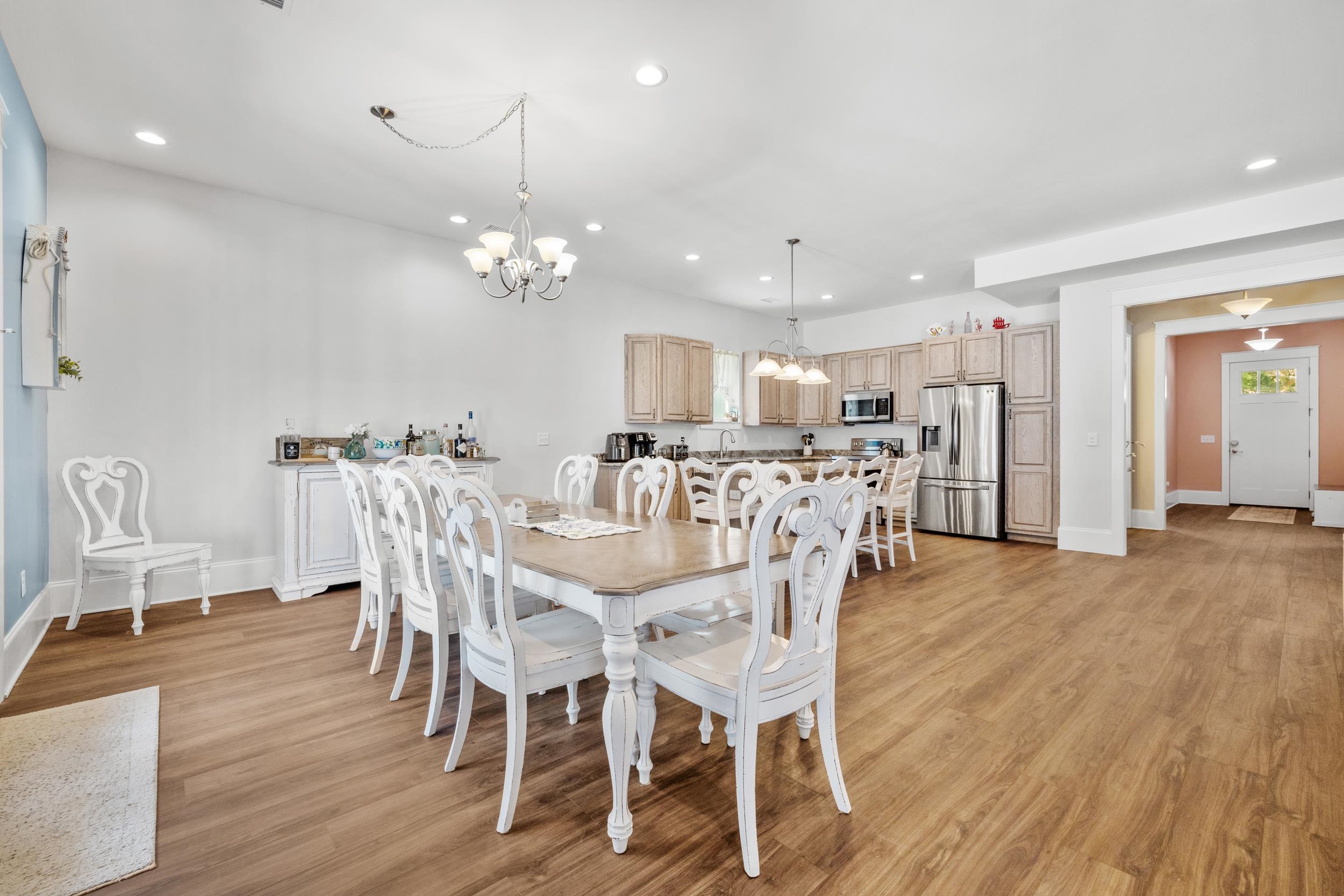 5907 Haskell Circle Myrtle Beach, SC 29577 - Photo 6 of 38 Dining room with recessed lighting, light wood-style flooring, and a chandelier