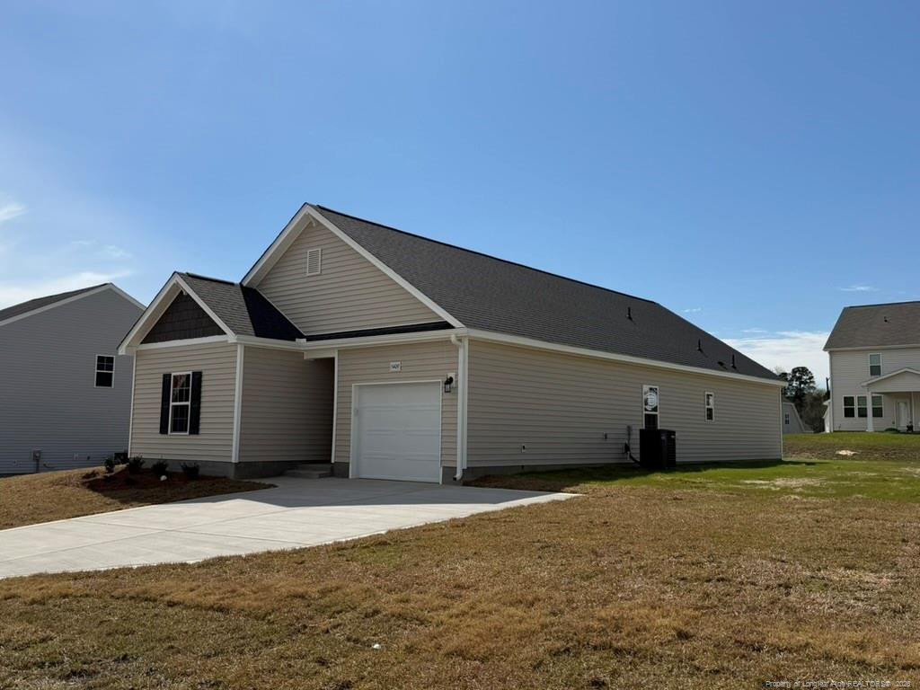 5409 Short Leaf Road Fayetteville, NC 28311 - Photo 2 of 40 a front view of a house with a yard