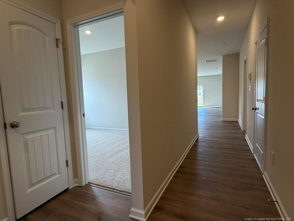 5409 Short Leaf Road Fayetteville, NC 28311 - Photo 3 of 40 a view of a hallway with the wooden floor