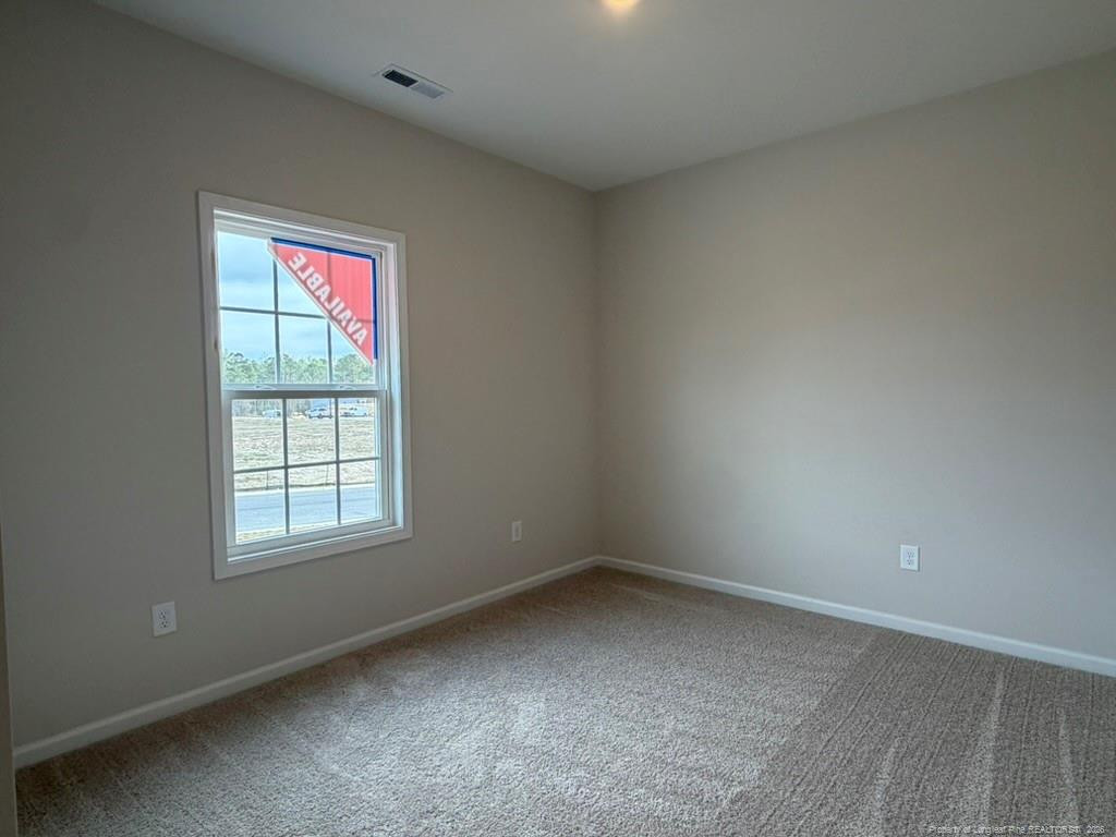 5409 Short Leaf Road Fayetteville, NC 28311 - Photo 4 of 40 an empty room with a window