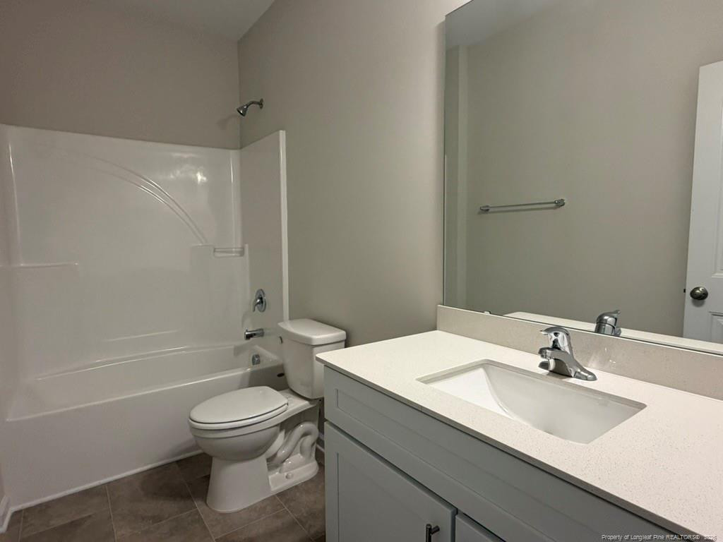 5409 Short Leaf Road Fayetteville, NC 28311 - Photo 6 of 40 a bathroom with a sink toilet and shower