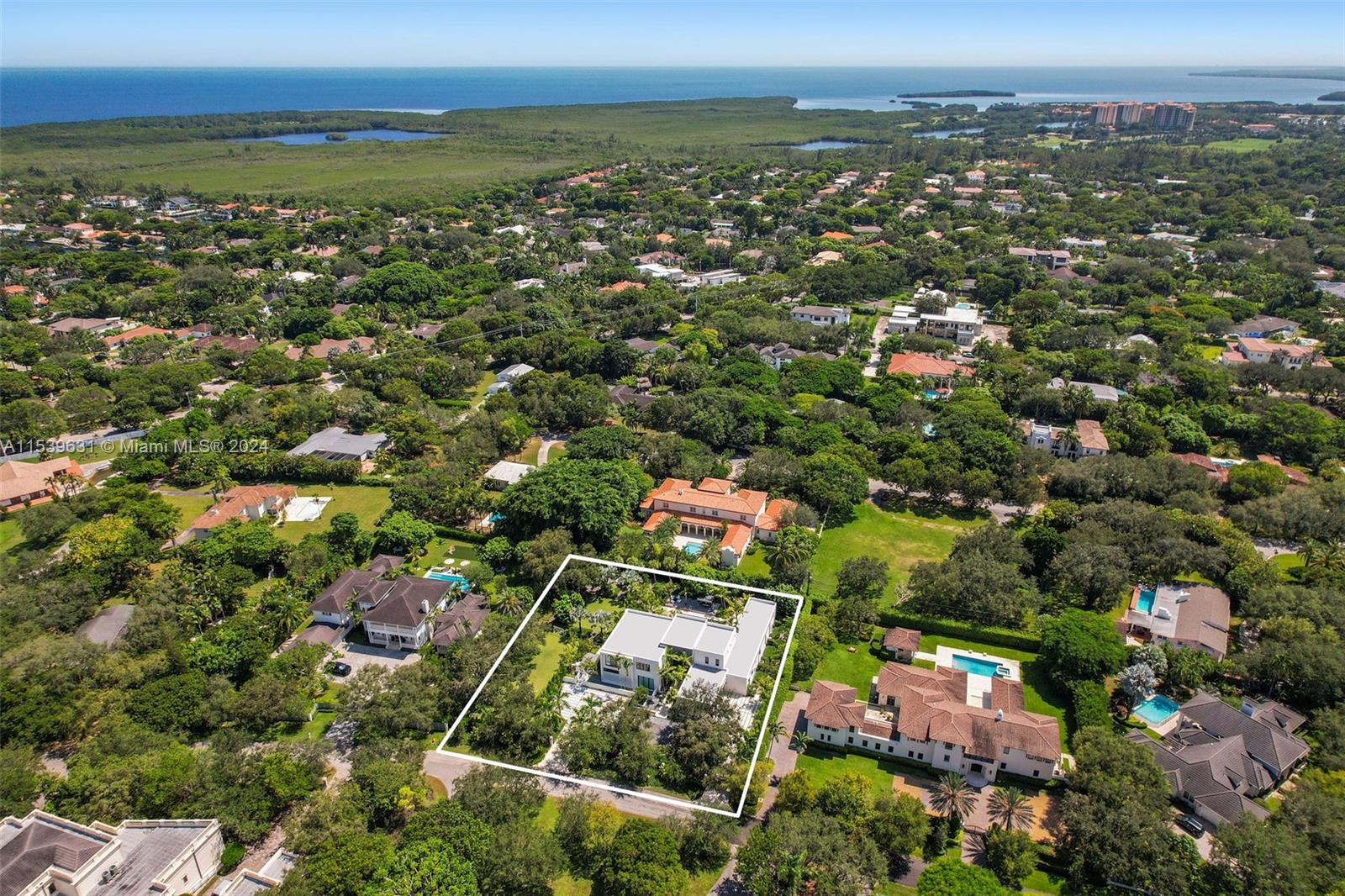 5840 Moss Ranch Road Pinecrest, FL 33156 - Photo 3 of 83 an aerial view of multiple house