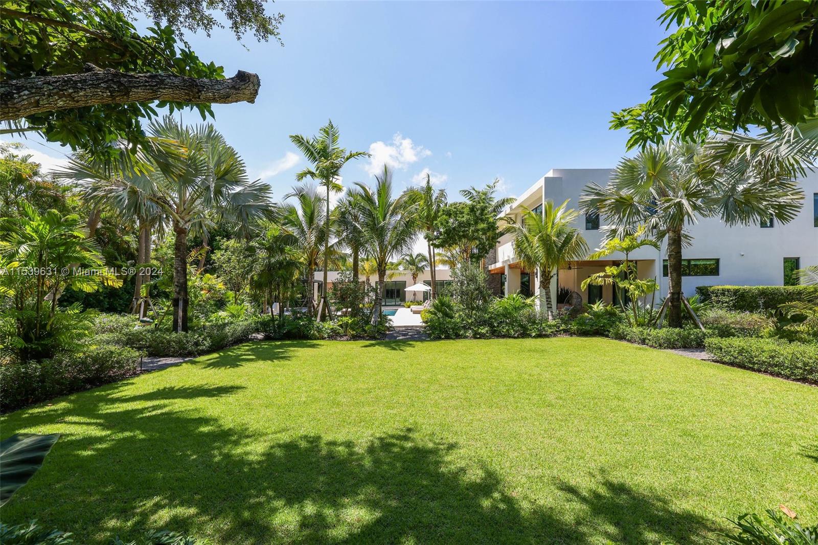 5840 Moss Ranch Road Pinecrest, FL 33156 - Photo 80 of 83 a view of a trees with a big yard