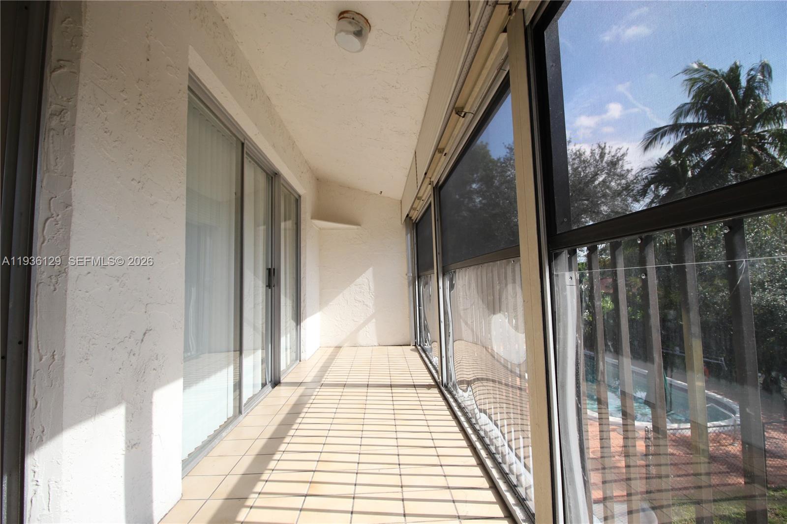 8990 West Sample Road, Unit 206 Coral Springs, FL 33065 - Photo 22 of 28 a view of a balcony