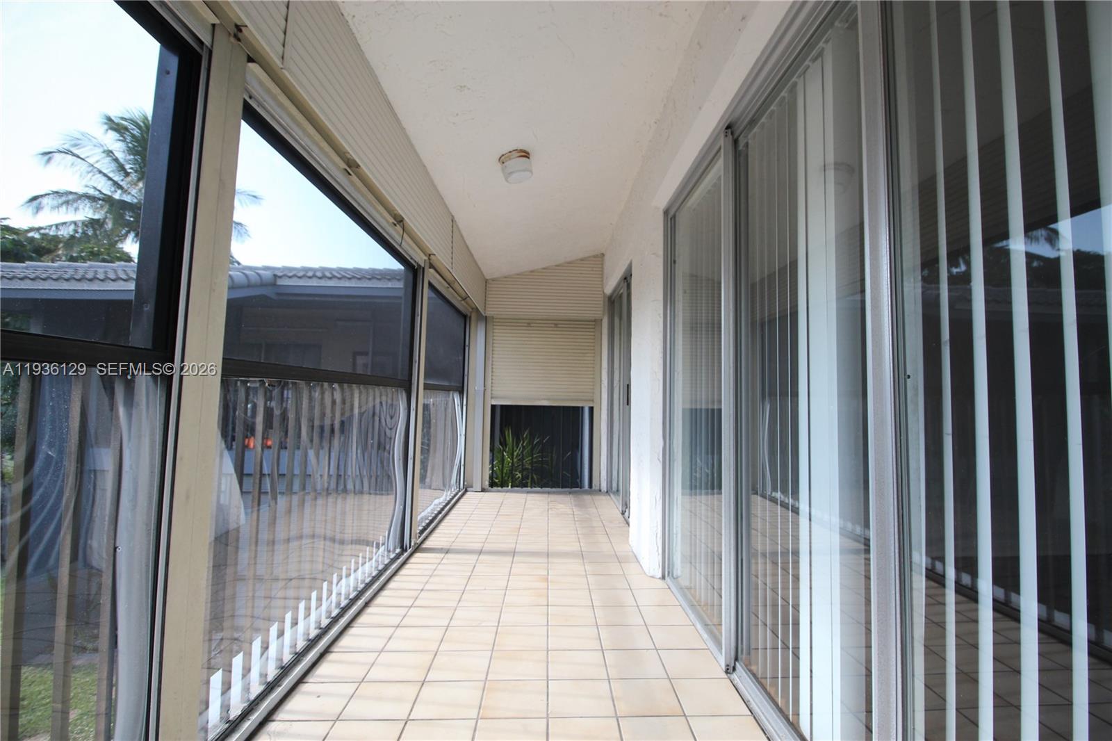 8990 West Sample Road, Unit 206 Coral Springs, FL 33065 - Photo 23 of 28 a view of a balcony