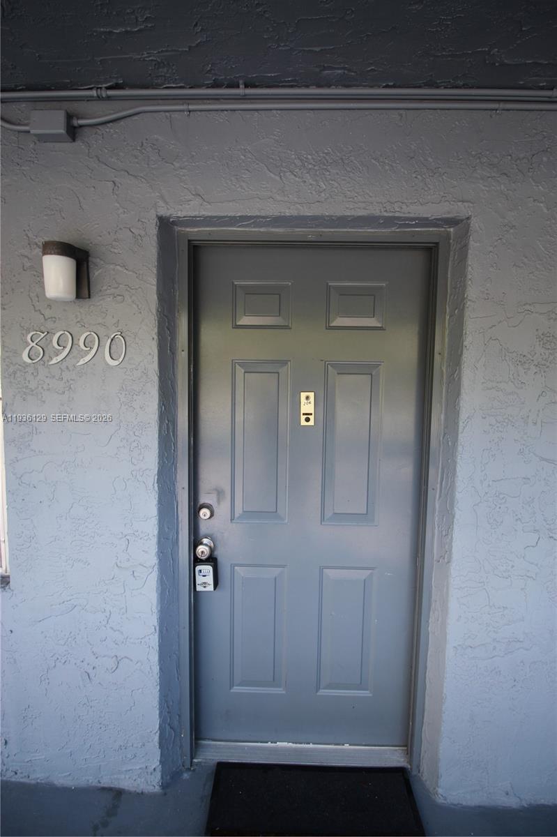 8990 West Sample Road, Unit 206 Coral Springs, FL 33065 - Photo 27 of 28 front view of a bathroom