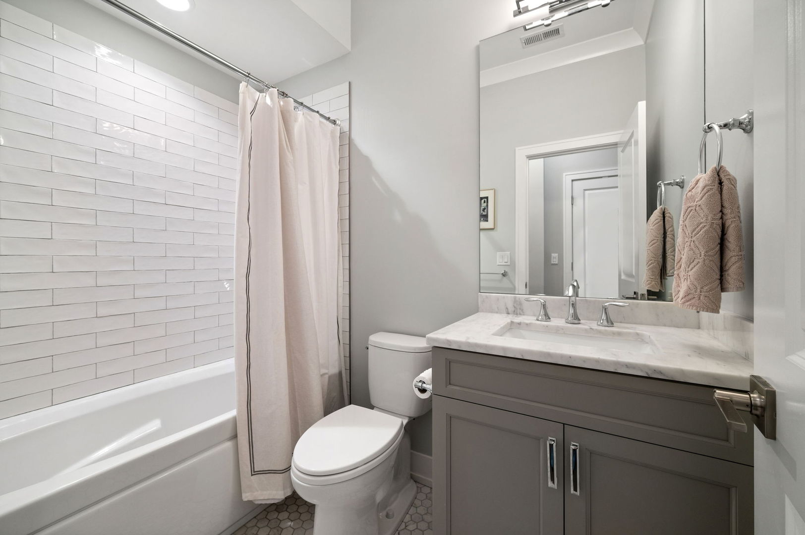 1341 West George Street, Unit 2 Chicago, IL 60657 - Photo 18 of 20 a bathroom with a sink toilet and shower