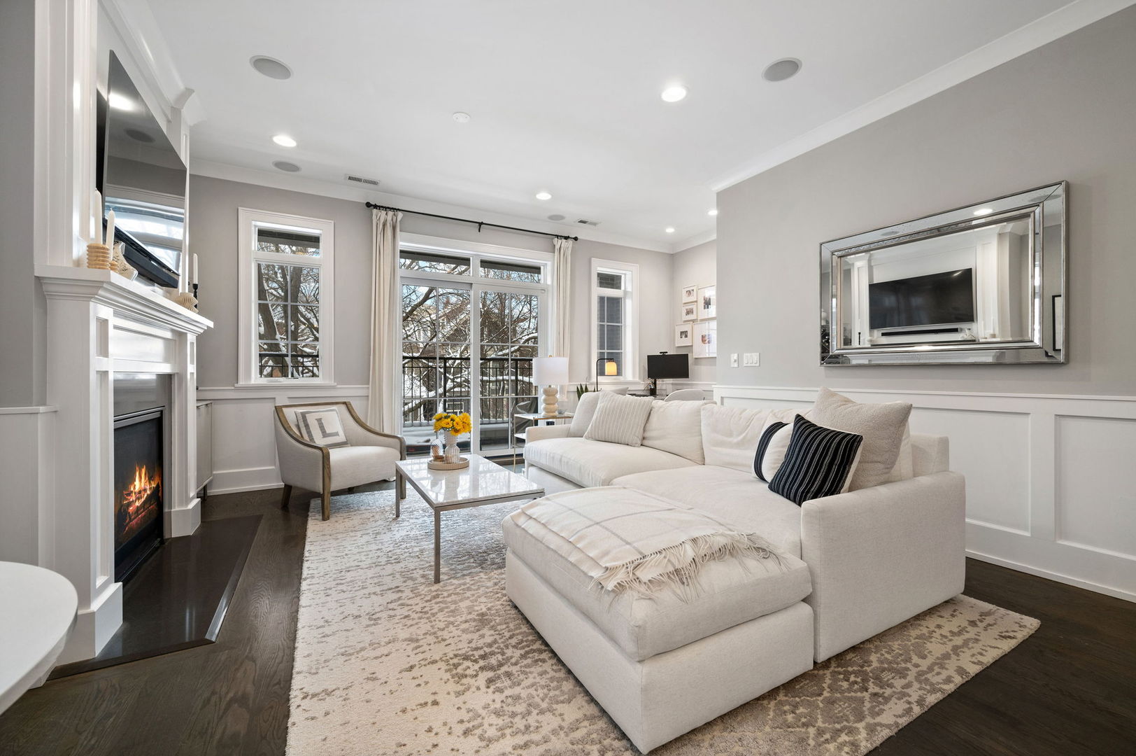 1341 West George Street, Unit 2 Chicago, IL 60657 - Photo 5 of 20 a living room with furniture fireplace and flat screen tv