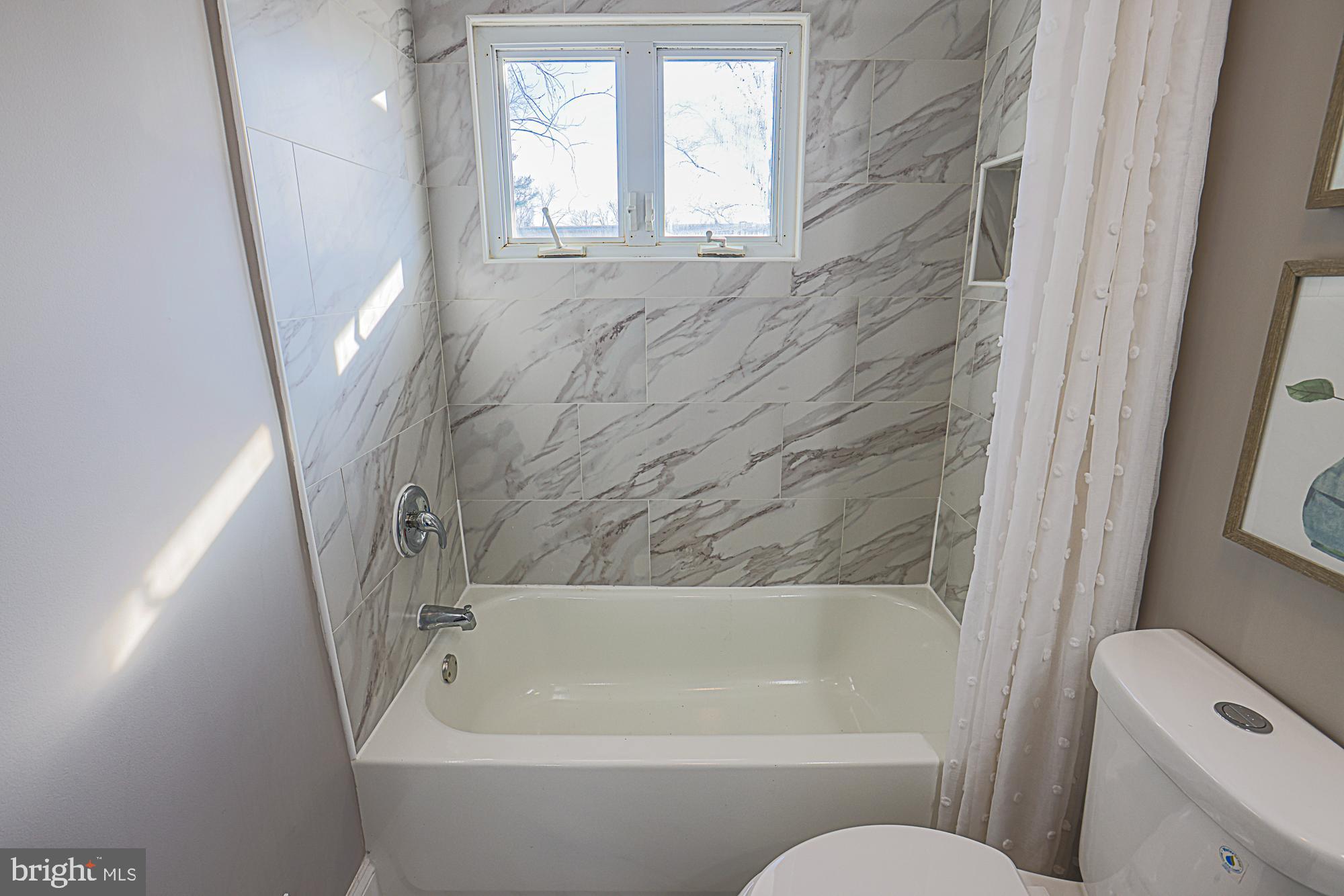 6853 Queens Ferry Road Baltimore, MD 21239 - Photo 31 of 53 Full Hallway Bath