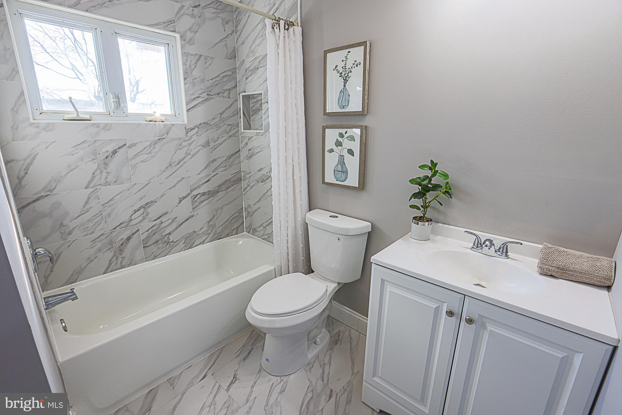 6853 Queens Ferry Road Baltimore, MD 21239 - Photo 32 of 53 Full Hallway Bath