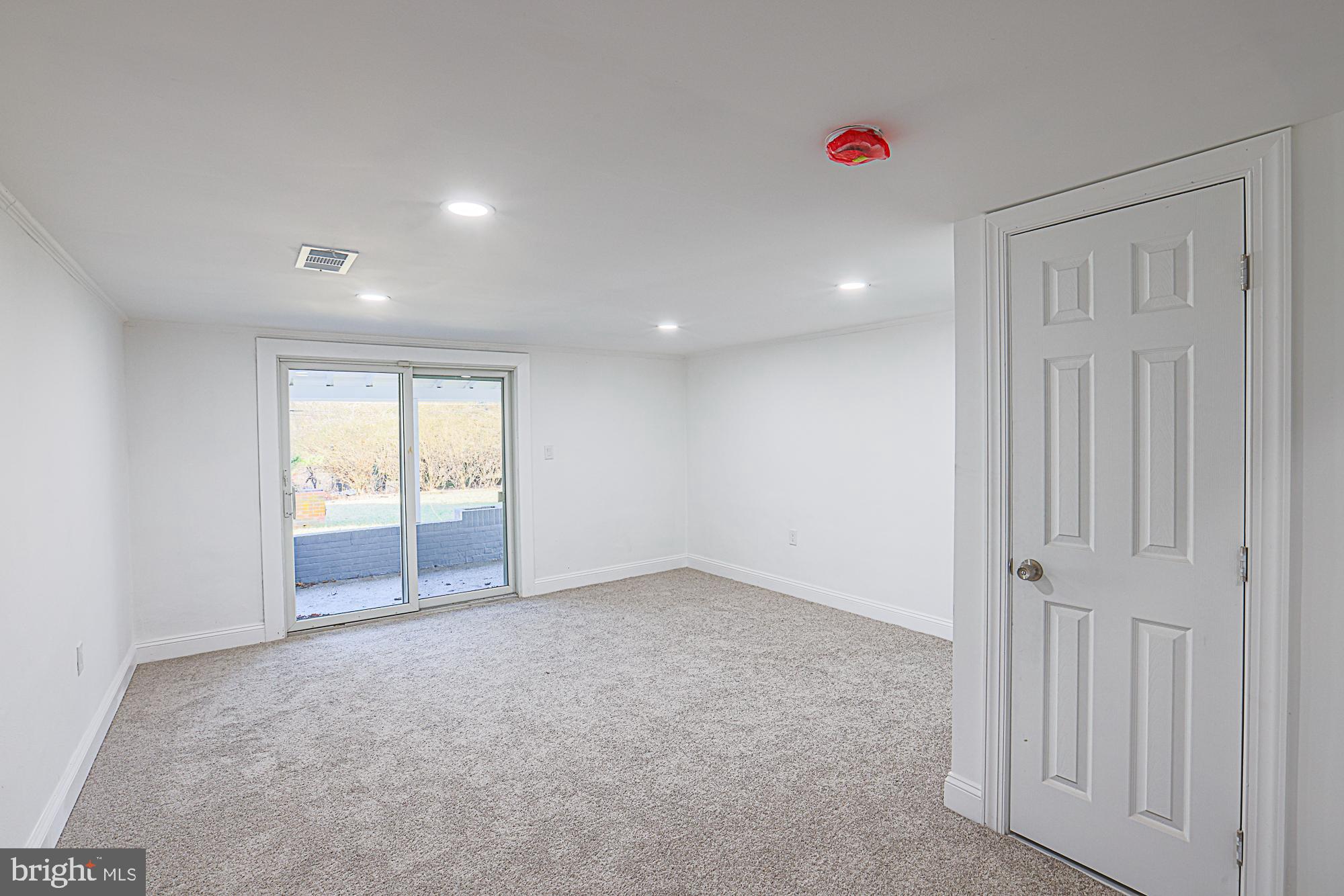 6853 Queens Ferry Road Baltimore, MD 21239 - Photo 34 of 53 Lower Level Recreation Room