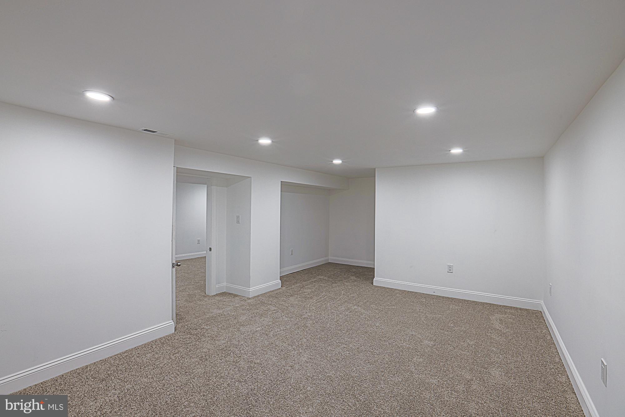 6853 Queens Ferry Road Baltimore, MD 21239 - Photo 36 of 53 Lower Level Recreation Room