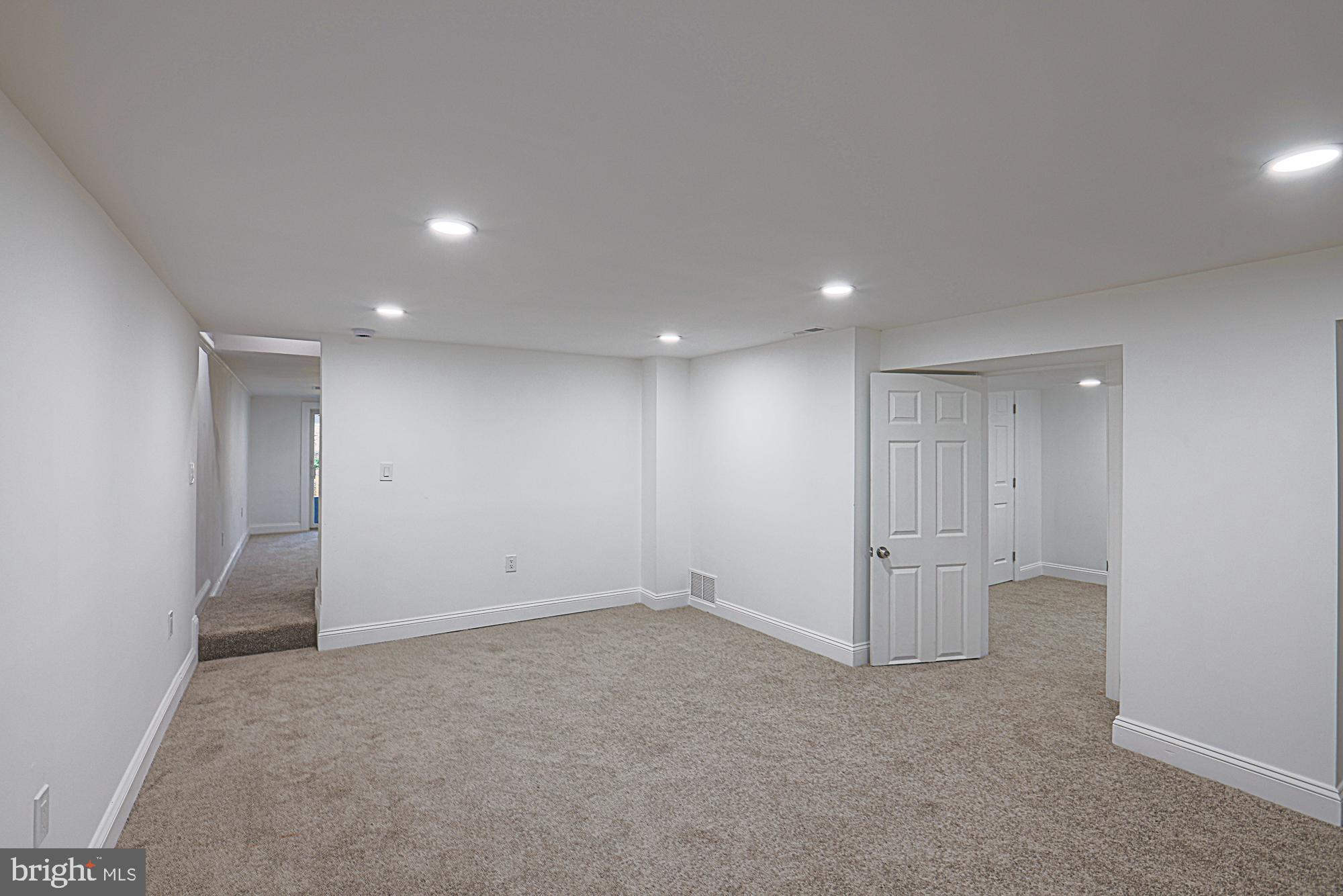 6853 Queens Ferry Road Baltimore, MD 21239 - Photo 37 of 53 Lower Level Recreation Room