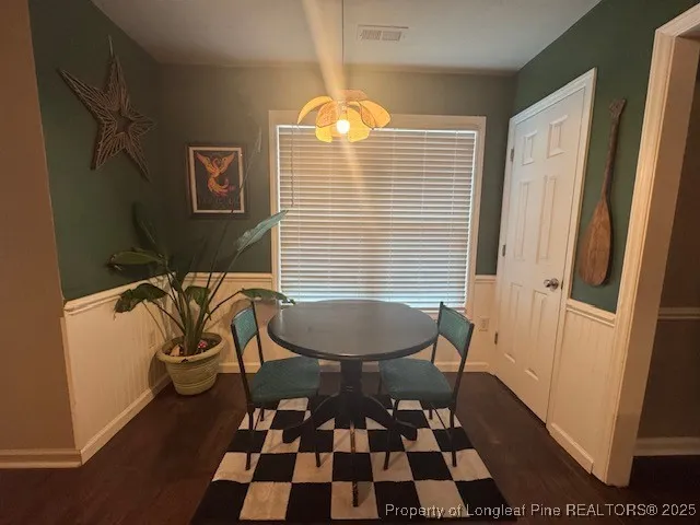 a room with furniture and a rug