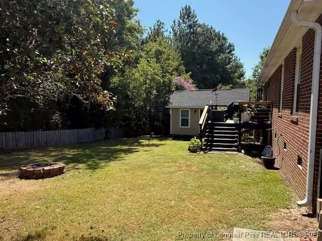 a view of a house with swimming pool and porch