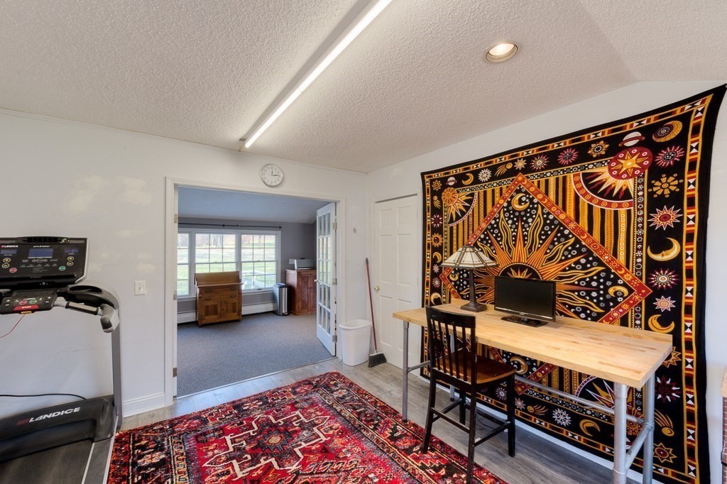 33 Upper Palmer Road Monson, MA 01057 - Photo 20 of 42 a living room with furniture a rug and a window