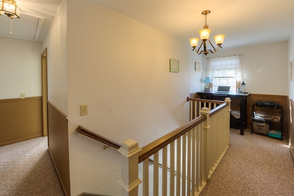 33 Upper Palmer Road Monson, MA 01057 - Photo 34 of 42 a view of a hallway with a kitchen