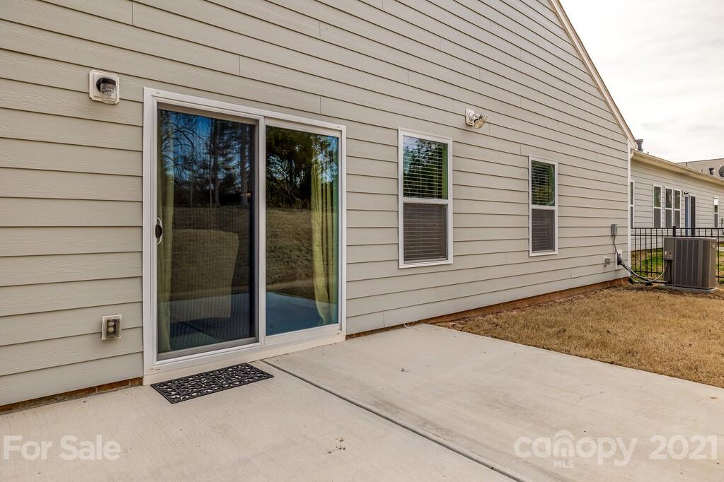 1592 Spring Blossom Trail Fort Mill, SC 29708 - Photo 5 of 36 a view of front door and garage