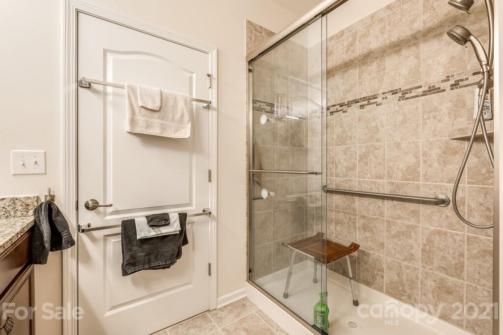 1592 Spring Blossom Trail Fort Mill, SC 29708 - Photo 8 of 36 a bathroom with a shower and a sink