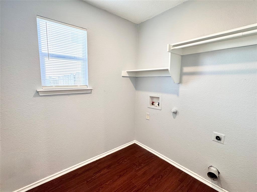 6723 Ambercrest Drive Arlington, TX 76002 - Photo 26 of 31 a view of a small space with wooden floor and a window