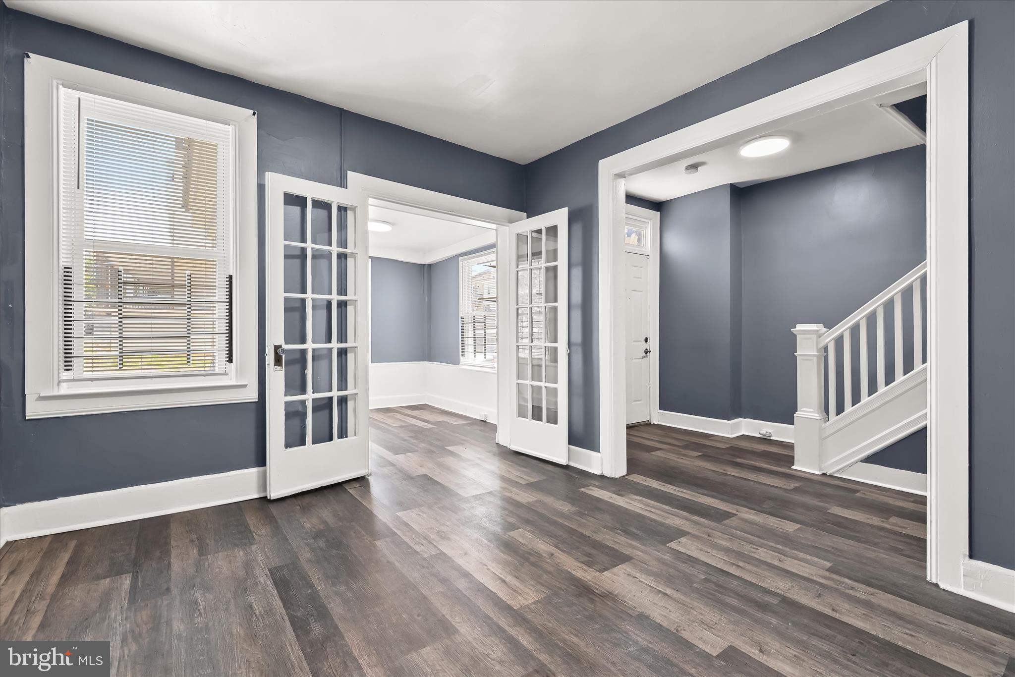 3534 Overview Road Baltimore, MD 21215 - Photo 7 of 28 a view of wooden floor and windows in a room