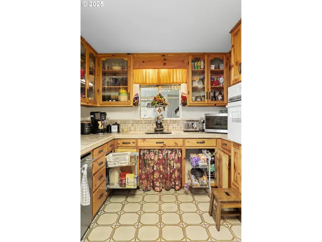 a bathroom with a sink mirror and a bathtub