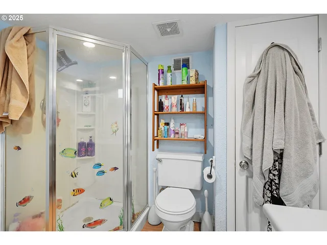 a bathroom with a sink and toilet