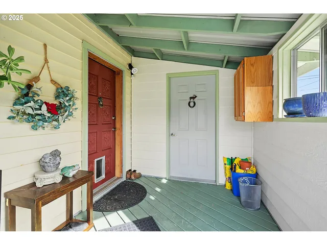 a view of living room with furniture and garden