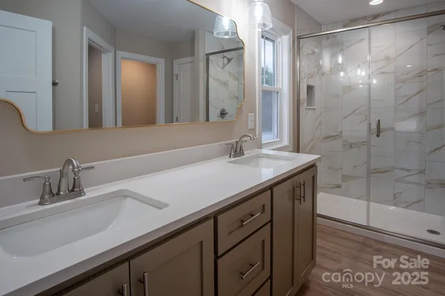 a bathroom with a sink and a mirror