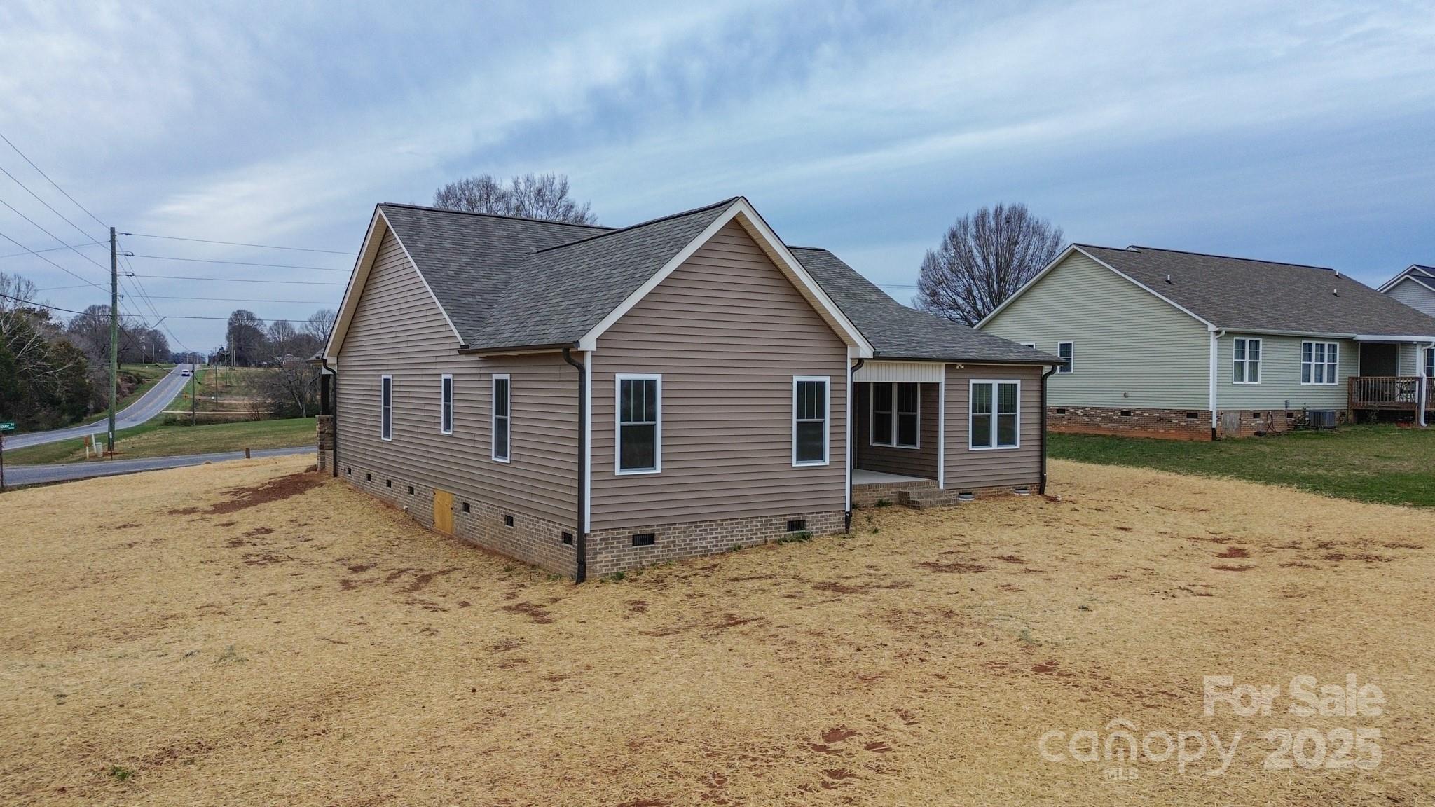 110 Alf Hoover Road Lincolnton, NC 28092 - Photo 32 of 35 a view of a house with a yard