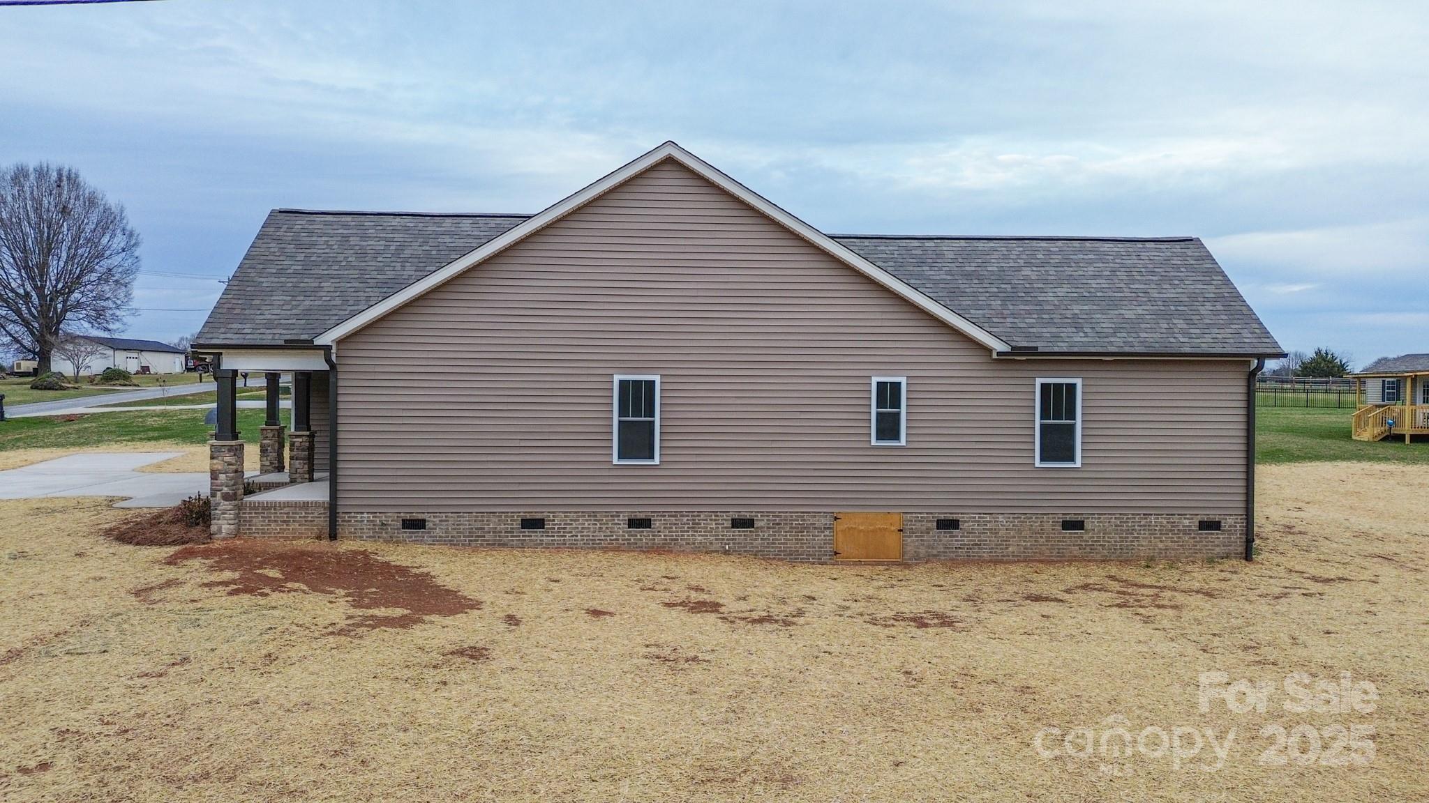 110 Alf Hoover Road Lincolnton, NC 28092 - Photo 34 of 35 a view of a house with wooden fence