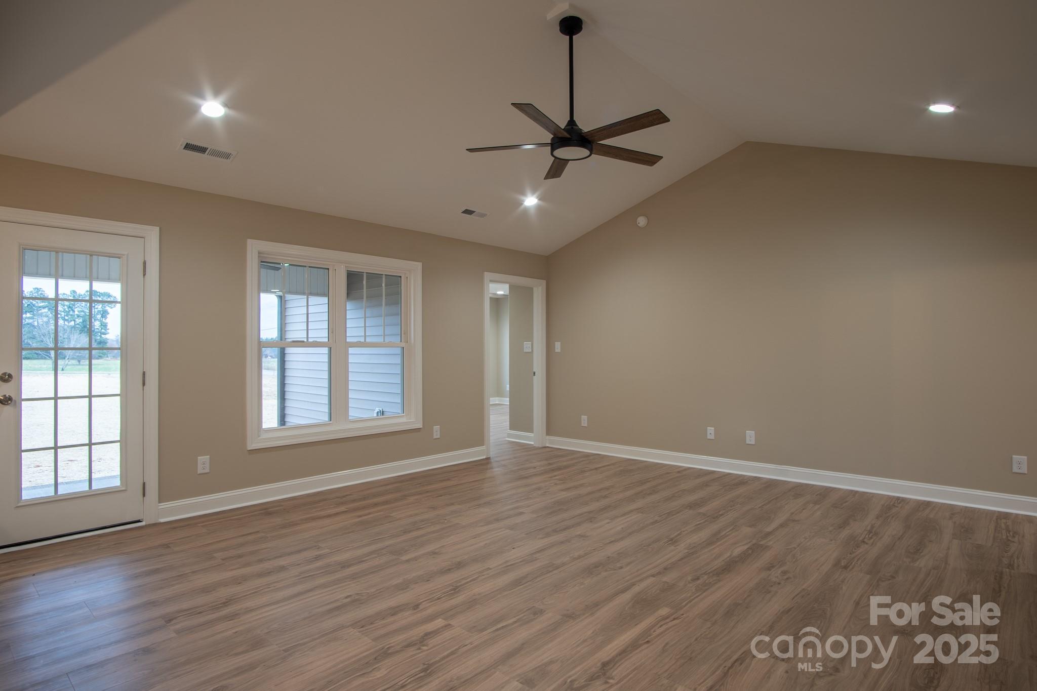 110 Alf Hoover Road Lincolnton, NC 28092 - Photo 7 of 35 wooden floor in an empty room with a window