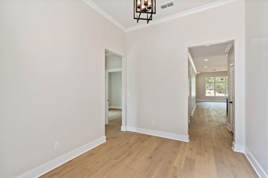 335 Perdanales Bullard, TX 75757 - Photo 6 of 37 an empty room with wooden floor and windows