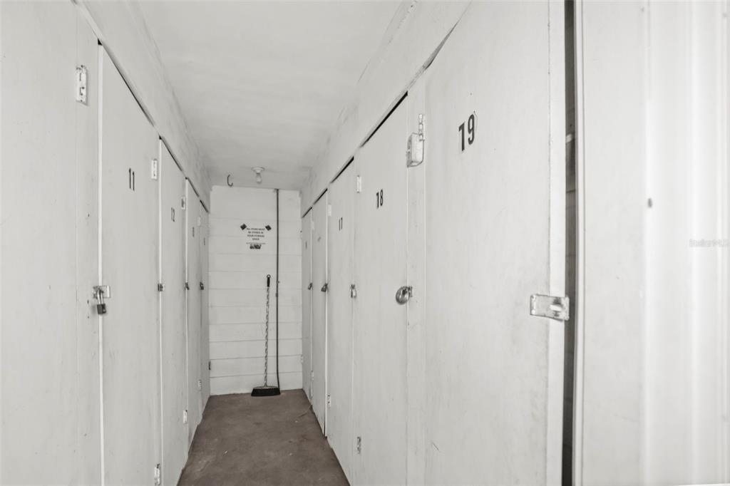 11655 3rd Street East, Unit 19 Treasure Island, FL 33706 - Photo 33 of 48 a view of a hallway with white doors