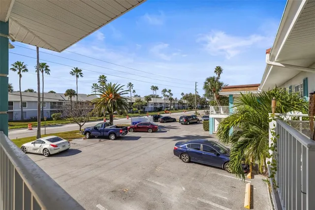 an aerial view of a house with a lake view
