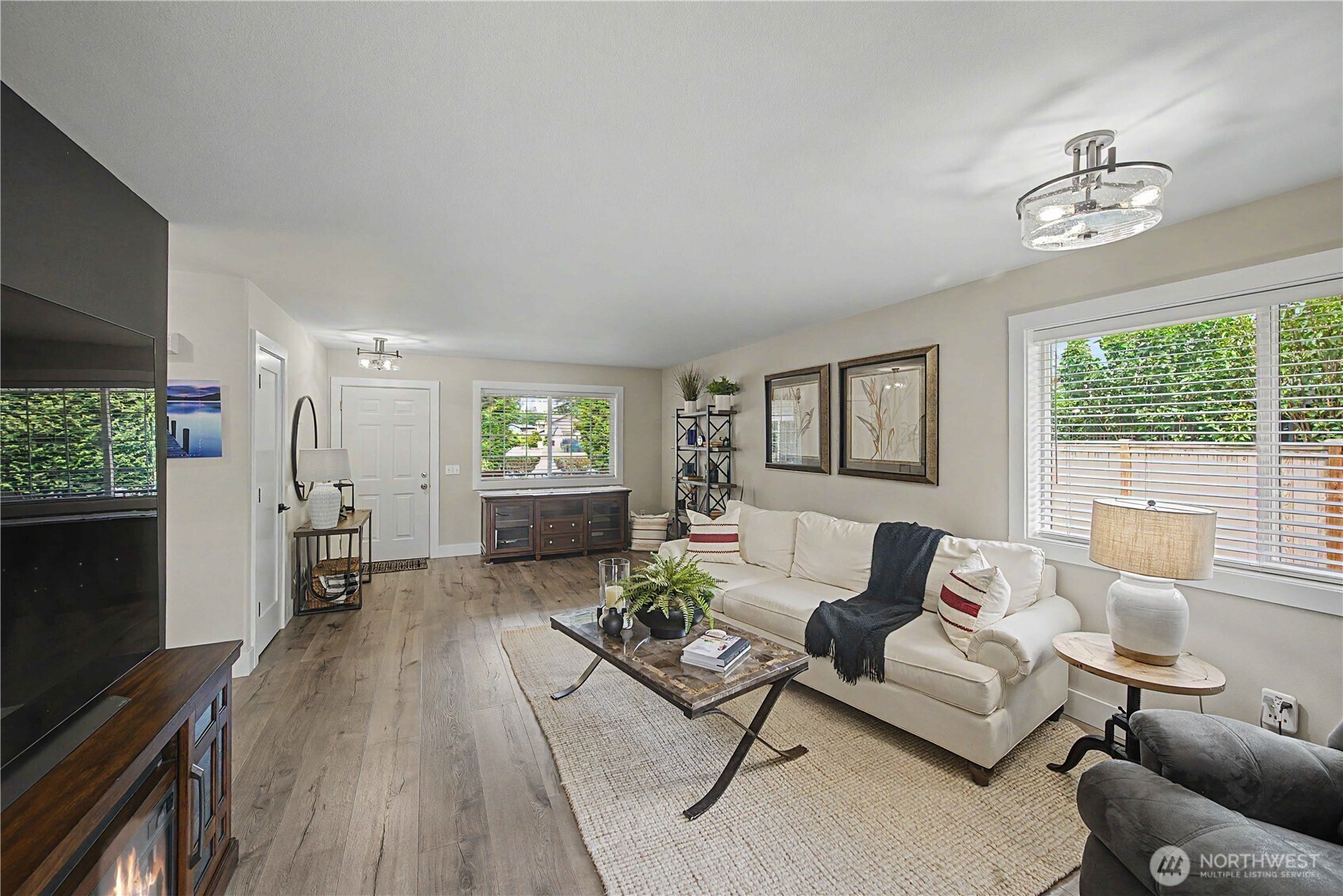 20919 Ronning Road Arlington, WA 98223 - Photo 5 of 28 a living room with furniture and a flat screen tv
