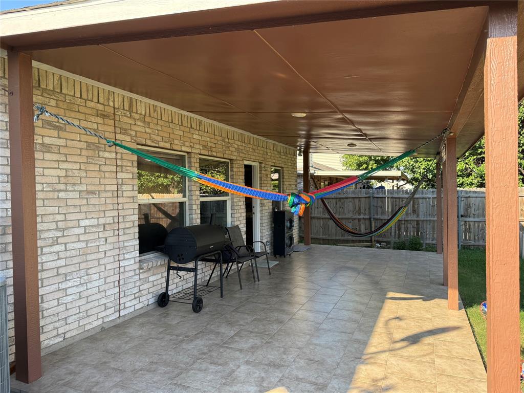 5718 Green Ivy Road Denton, TX 76210 - Photo 21 of 23 View of patio with grilling area