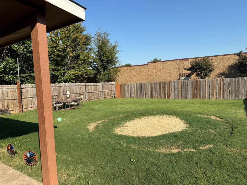 5718 Green Ivy Road Denton, TX 76210 - Photo 22 of 23 View of fenced backyard