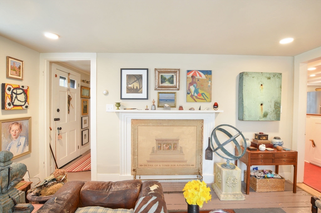 1150 Russells Mills Road Dartmouth, MA 02748 - Photo 12 of 31 a bedroom with furniture and a chandelier