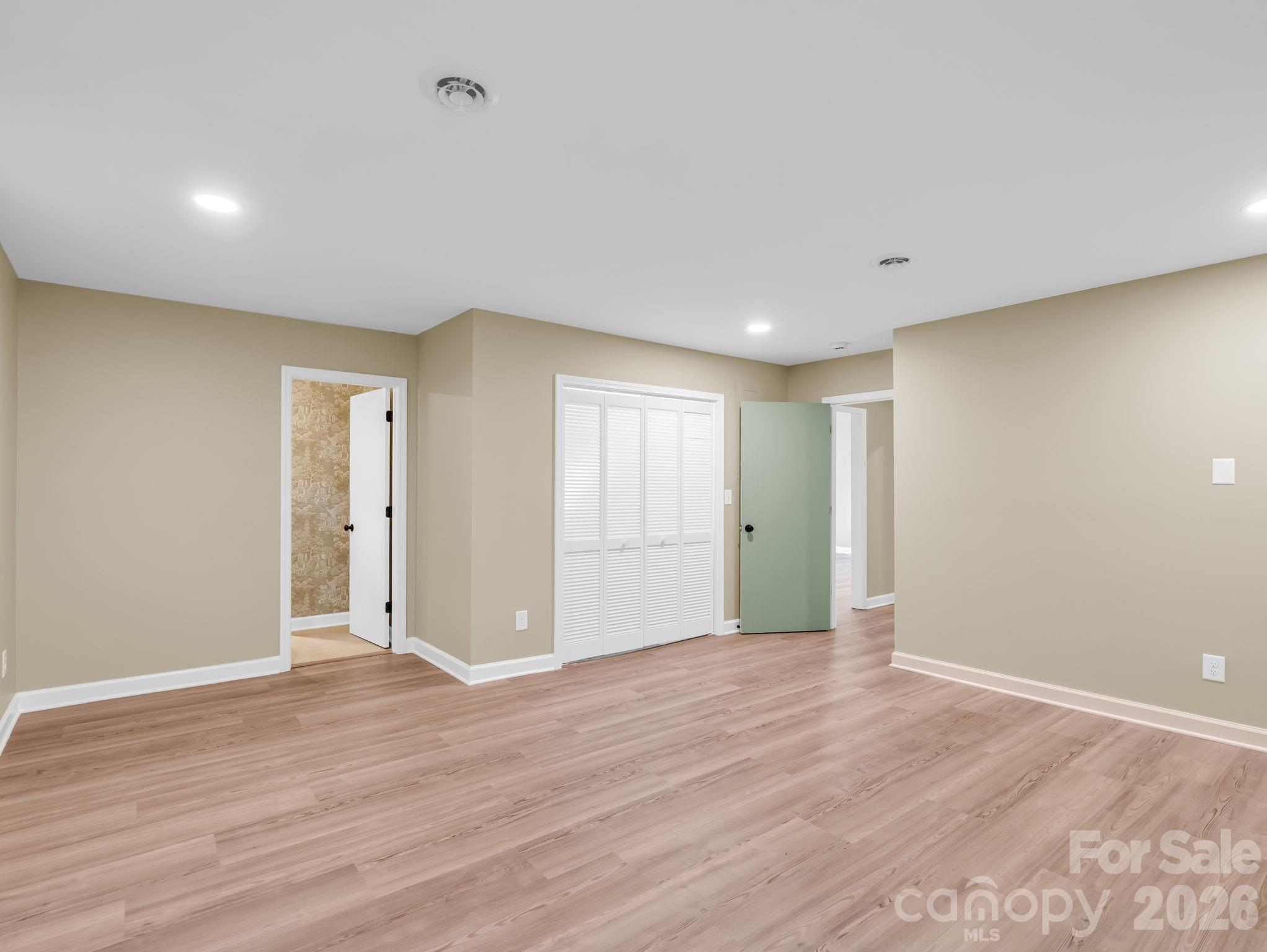 44 Jervey Road, Unit 4C Tryon, NC 28782 - Photo 20 of 35 a view of an empty room with wooden floor