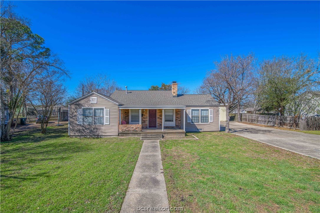 706 Edgemore Drive Bryan, TX 77802 - Photo 1 of 18 a front view of a house with a yard and trees