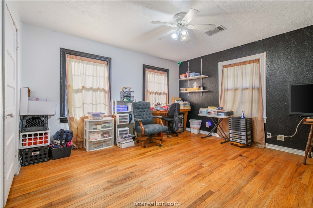 706 Edgemore Drive Bryan, TX 77802 - Photo 11 of 18 a room with furniture or chandelier and a window
