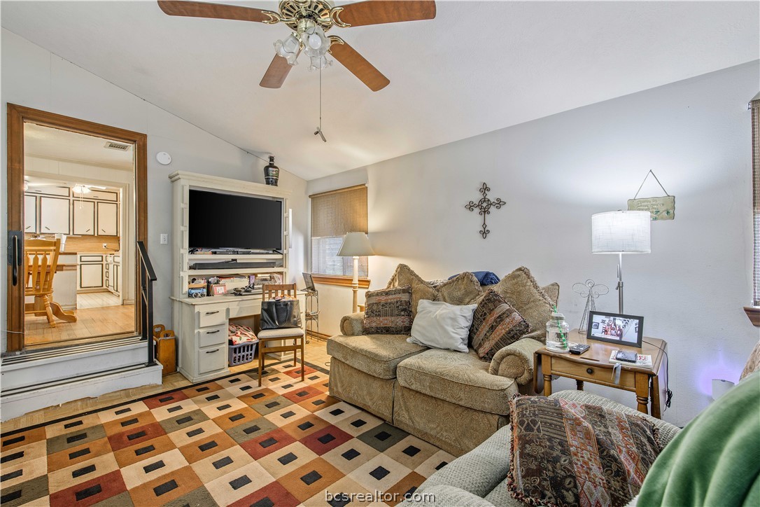 706 Edgemore Drive Bryan, TX 77802 - Photo 13 of 18 a living room with furniture and a flat screen tv