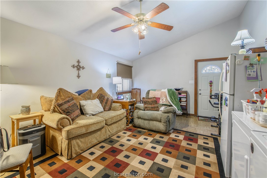 706 Edgemore Drive Bryan, TX 77802 - Photo 14 of 18 a living room with furniture and a rug