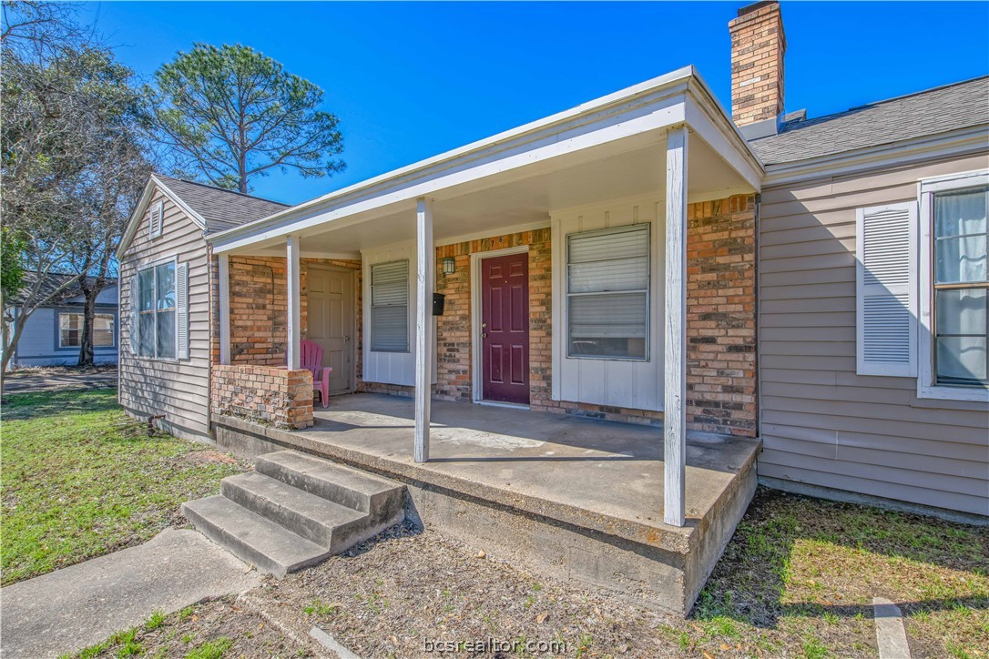 706 Edgemore Drive Bryan, TX 77802 - Photo 3 of 18 a view of a house with backyard and porch
