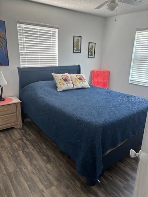 115 15th Avenue, Unit A Indian Rocks Beach, FL 33785 - Photo 22 of 65 a bedroom with a bed and window
