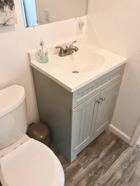 115 15th Avenue, Unit A Indian Rocks Beach, FL 33785 - Photo 27 of 65 a bathroom with a sink and a toilet