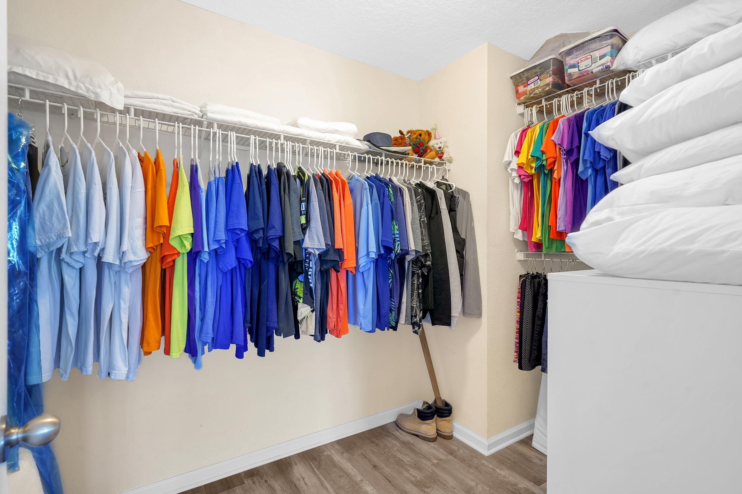 167 Codman Drive St. Augustine, FL 32084 - Photo 22 of 40 a view of walk in closet with clothes
