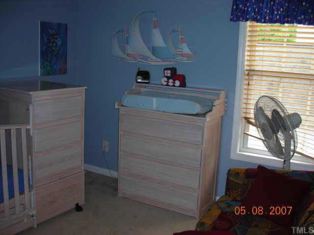 9020 Shallcross Way Raleigh, NC 27617 - Photo 6 of 8 a view of storage and utility room